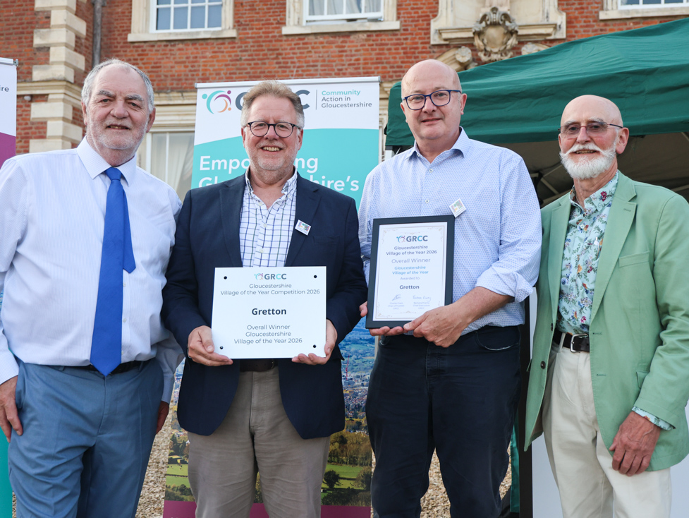 Representatives of Gretton Village receive their Overall Winner prize from the Chair and Vice Chair of GRCC's Board of Trustees at the awards ceremony at Highnam Court on July 16th 2026