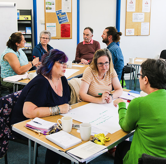 Members of a GRCC VCSE Network working together in small groups